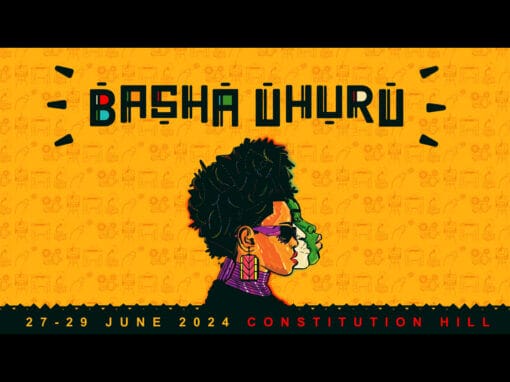 Illustrated promotional poster for the Basha Uhuru festival. It features a stylized profile of a person with short, spiky hair, wearing sunglasses, and adorned with colorful face paint and earrings. Text includes “Basha Uhuru,” event dates “27-29 June 2024,” and location “Constitution Hill.” Also watch the teaser video!