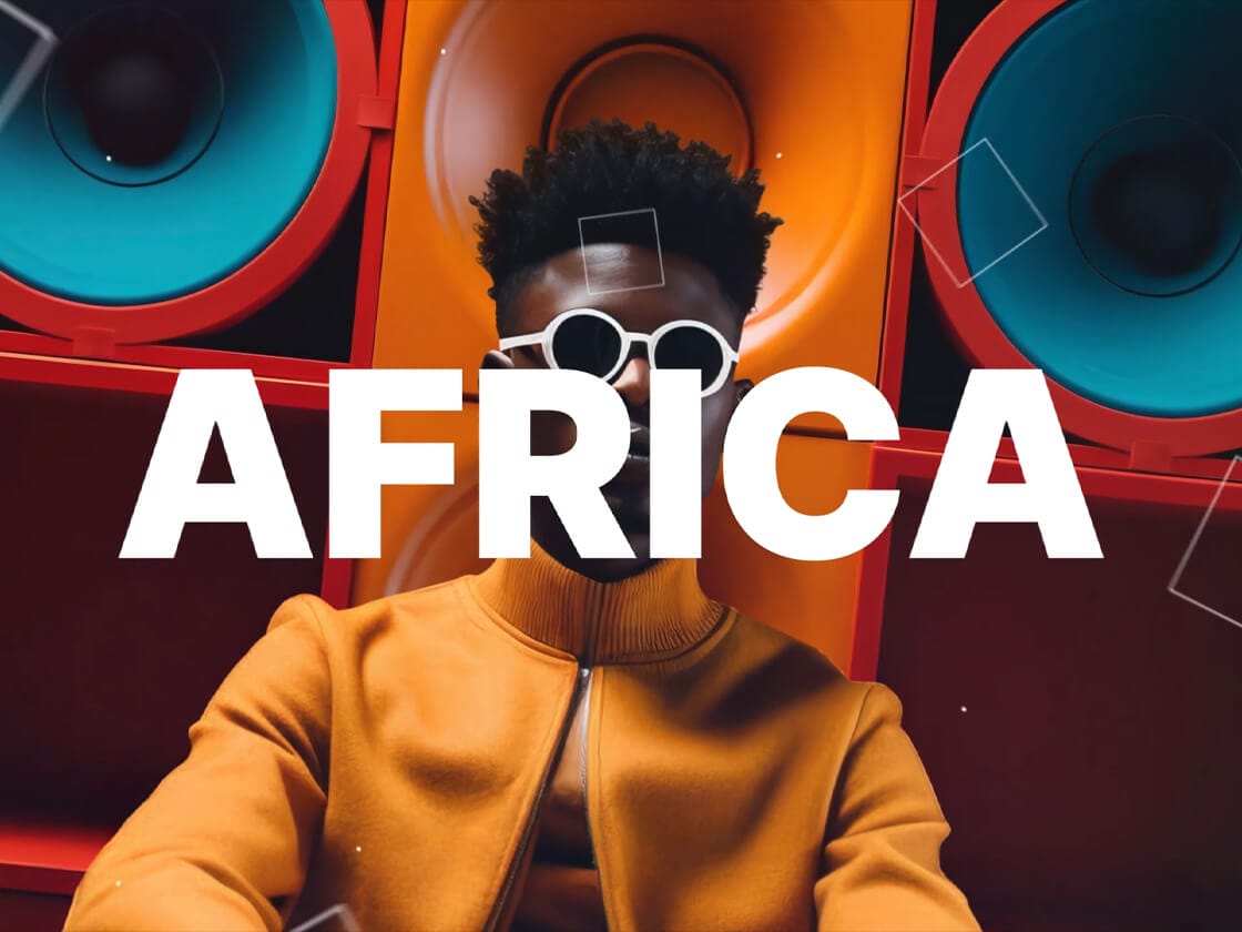 A person in stylish sunglasses and an orange jacket stands in front of colorful, oversized speakers. The bold white word “AFRICA” is centered over the image, partially covering the person’s face. Geometric shapes are faintly visible throughout.